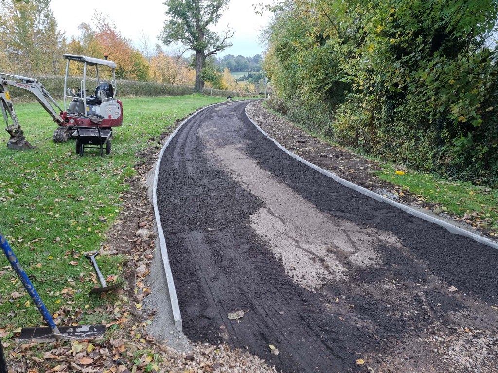 This is a large driveway which is in the process of having a tar and chip driveway installed on by Gillingham Driveways