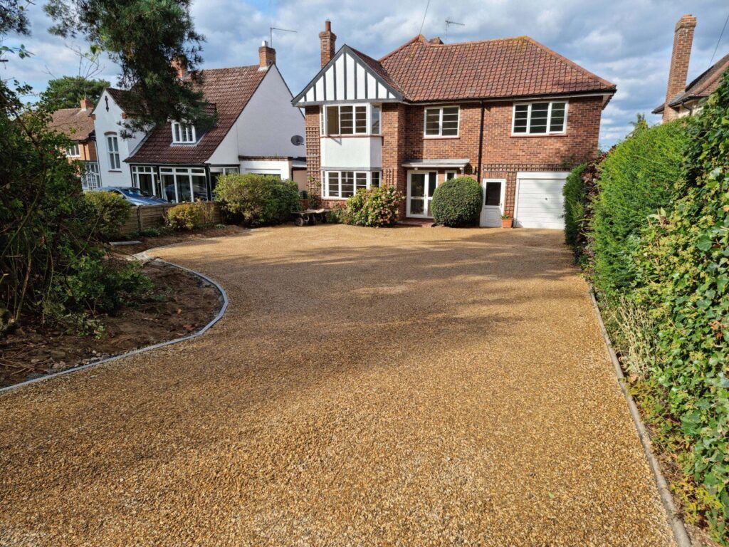 This is a newly installed tar and chip driveway installed by Gillingham Driveways